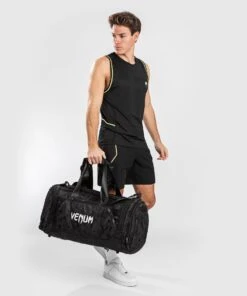 Venum Sports Bag Trainer Lite - Black/camo -ADIDAS Sales Shop 3c4820dcfb45ee27f675630f46f233ab826c6be3 SPORT BAG TRAINER LITE BLACK DARKCAMO 13