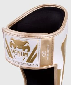 Venum ELITE Shin Guards - White/gold -ADIDAS Sales Shop e60a097ecd90455a1197448726fe930595673983 IMG 0320 2 copie